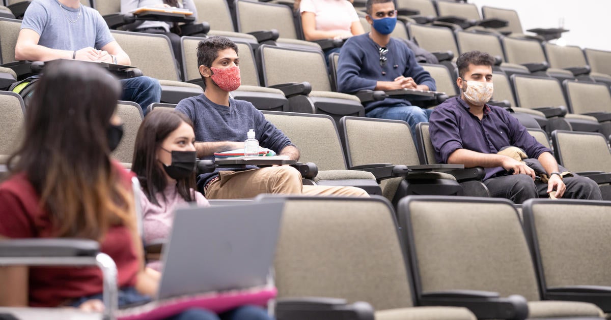 Mask Mandates Return To College Campuses As COVID 19 Flares CBS News