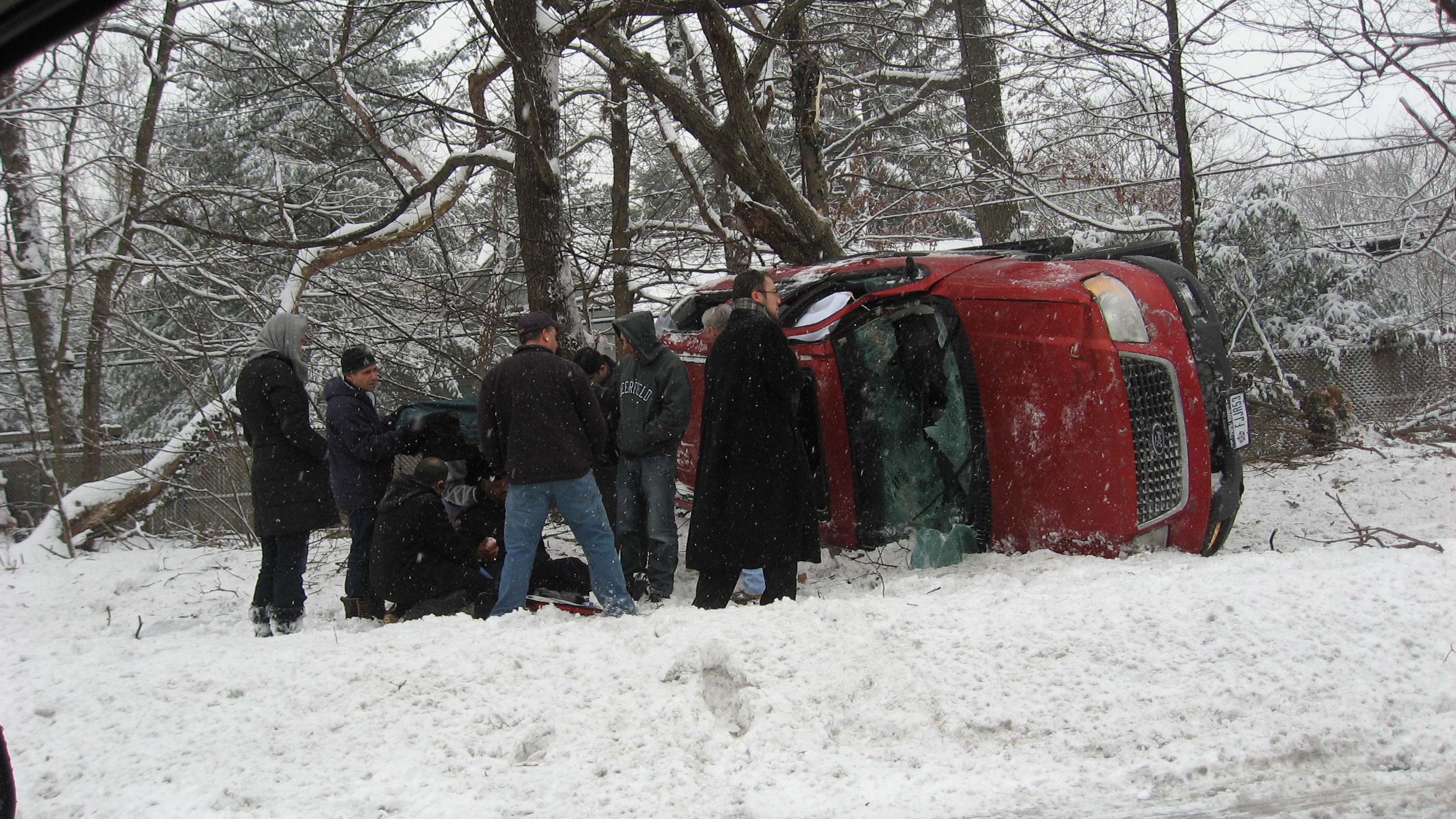 Car Overturned In Snow 