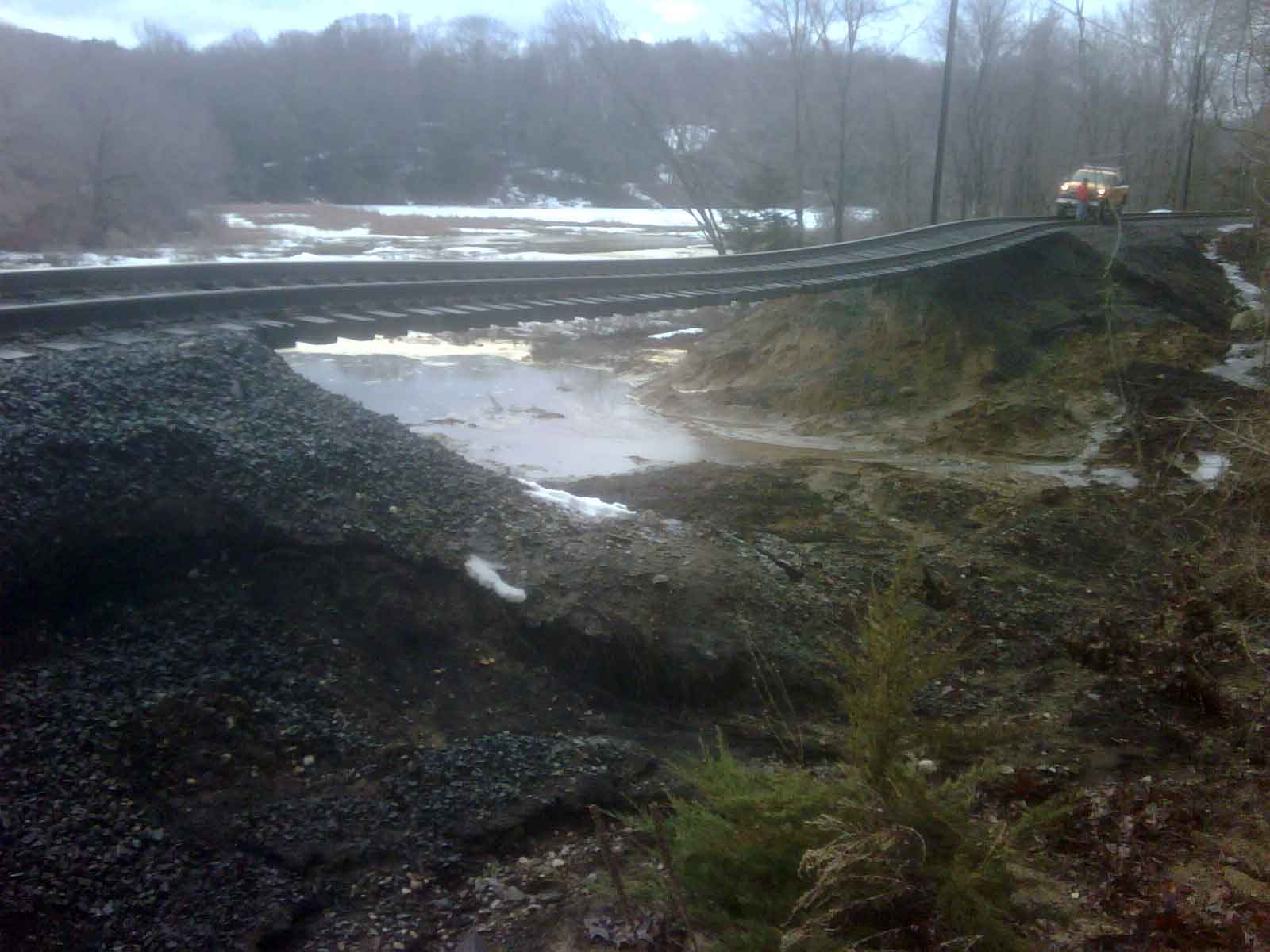 Flooding wash-out damage along Metro-North tracks on Danbury line  
