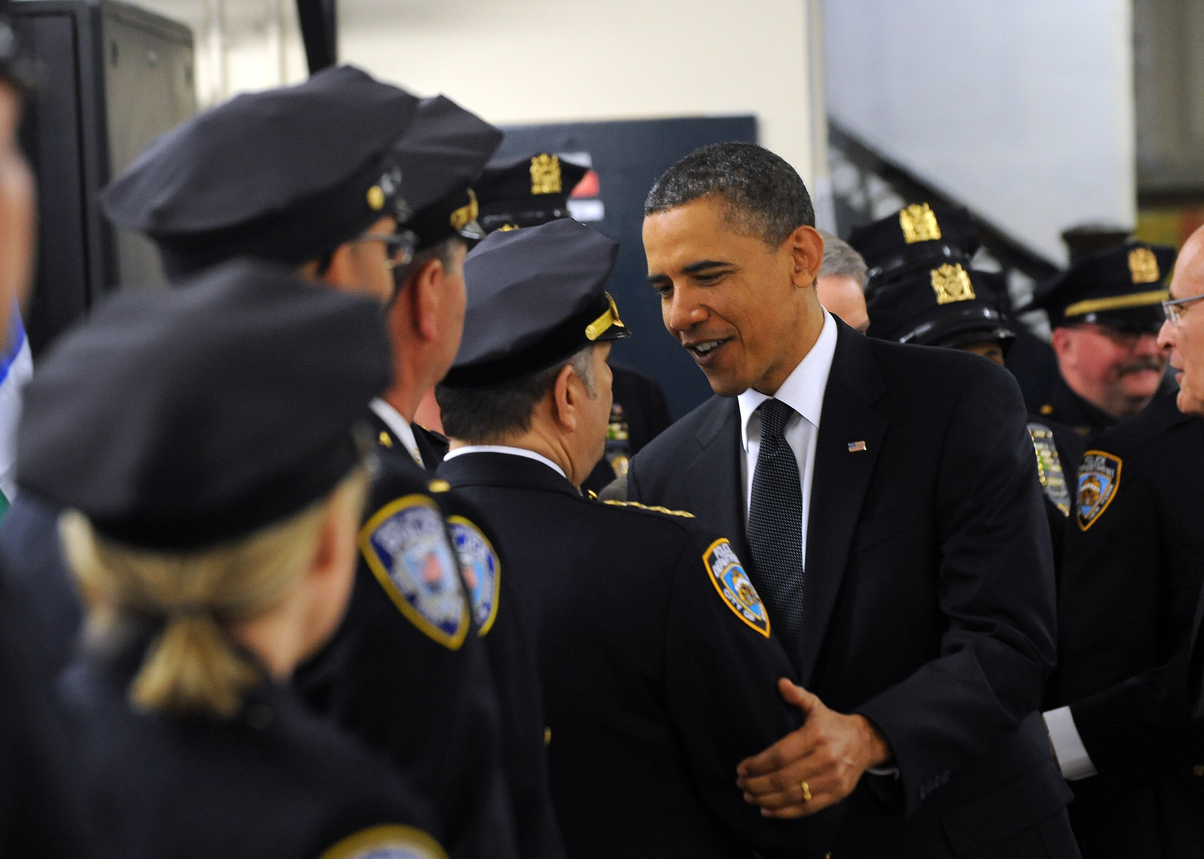 US President Barack Obama greets police 