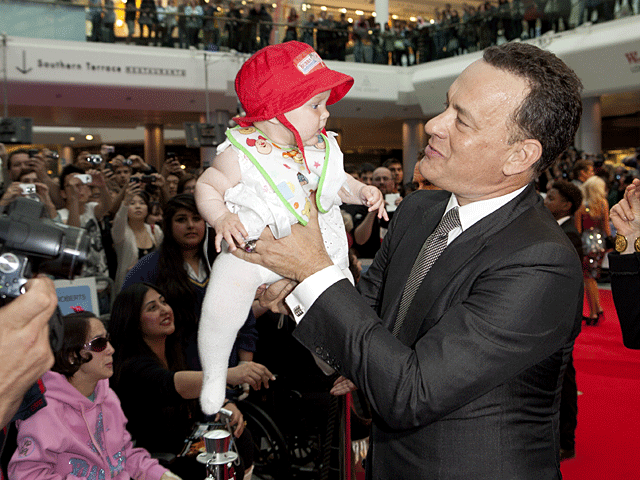 010-prem-tom-hanks-and-baby.gif 