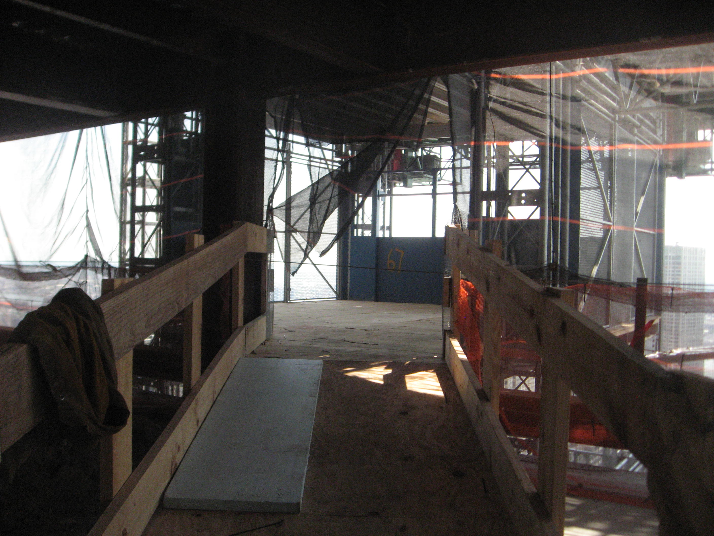 walls-and-floors-yet-to-be-finished-on-70th-floor-of-wtc1.jpg 