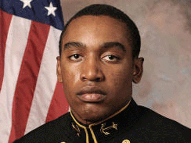 Graduates of the US Naval Academy sing the navy school song during the Naval Academy graduation ceremony at the Navy-Marine Corps Memorial Stadium on May 24, 2013 in Annapolis, Maryland. US President Barack Obama delivered the commencement address. 