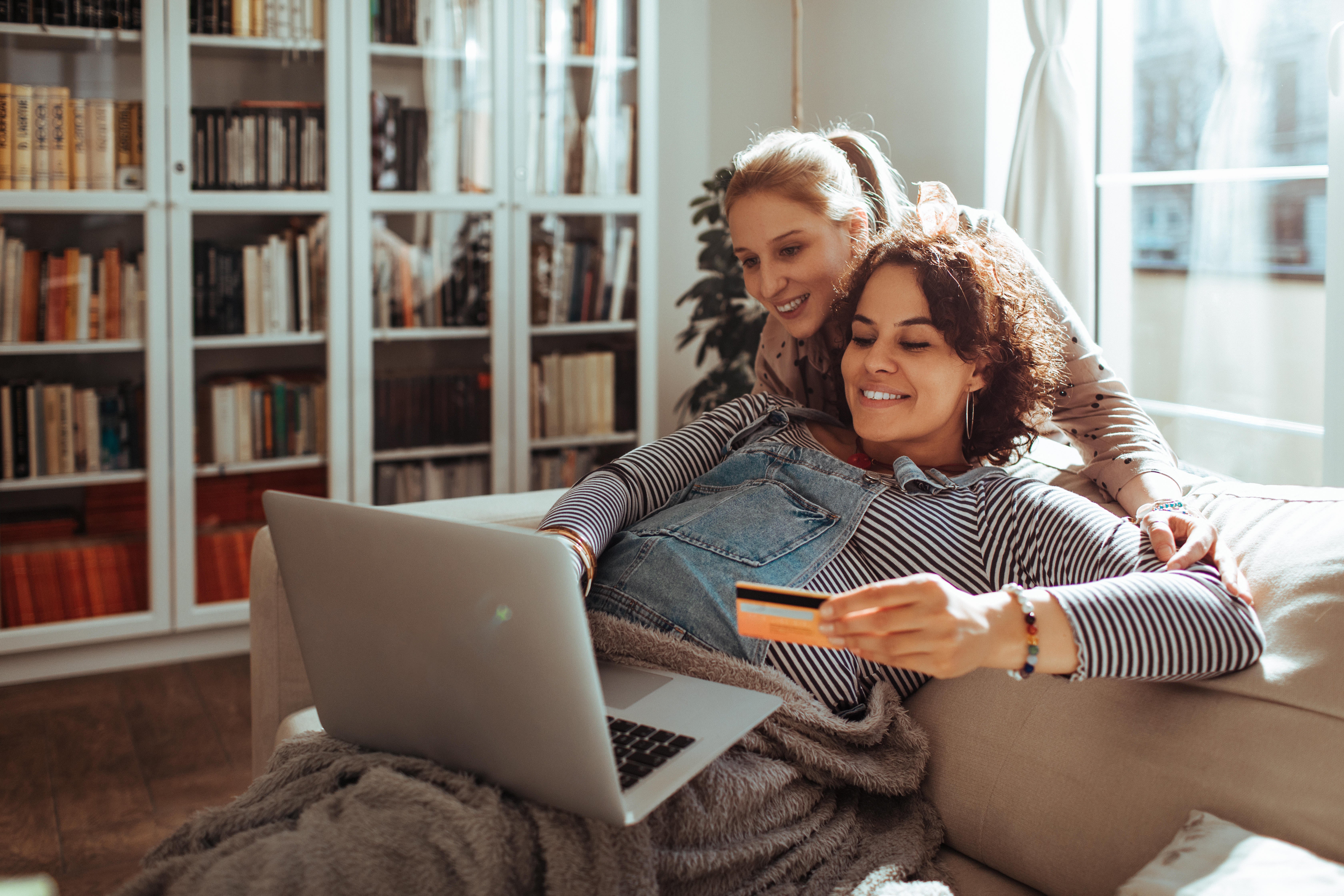 Female couple online shopping 