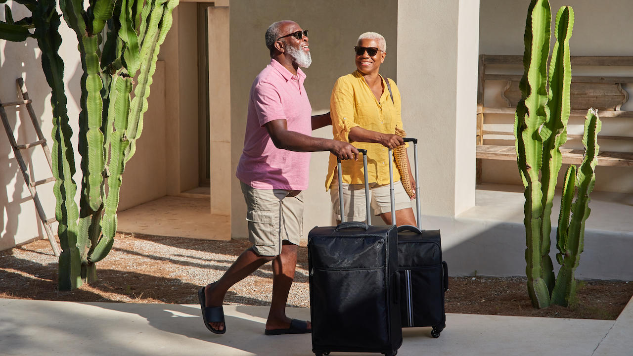 Couple traveling with luggage 