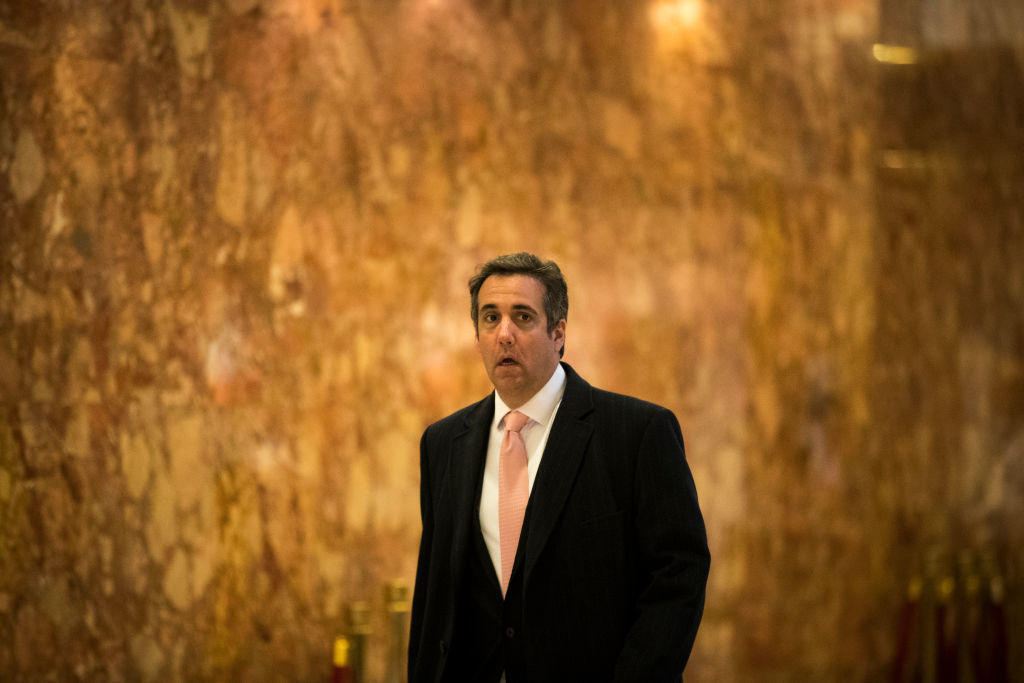Michael Cohen walks through the lobby at Trump Tower in New York on Jan. 12, 2017. 