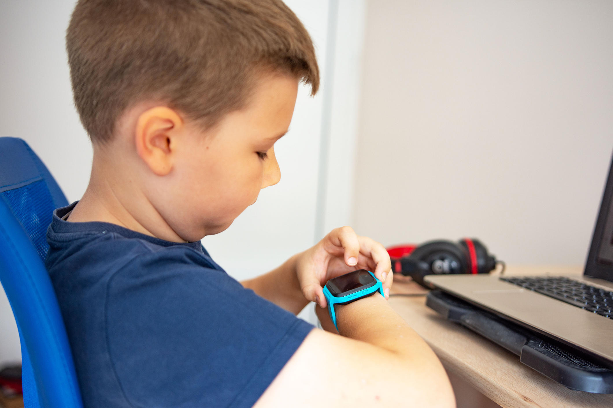 Boy using smartwatch 