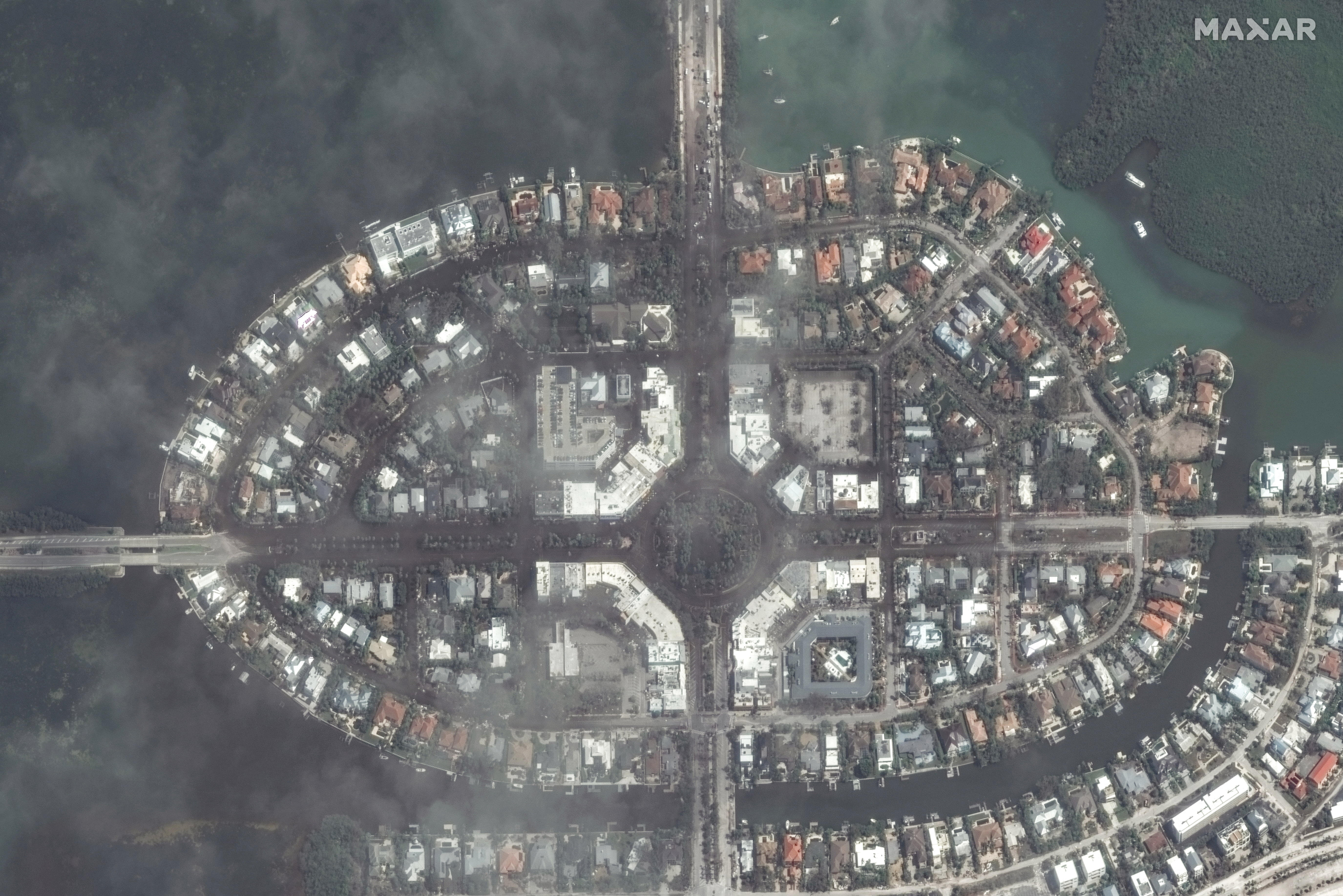 A satellite image shows flooded streets in St. Armands Key after Hurricane Milton in Sarasota, Florida 