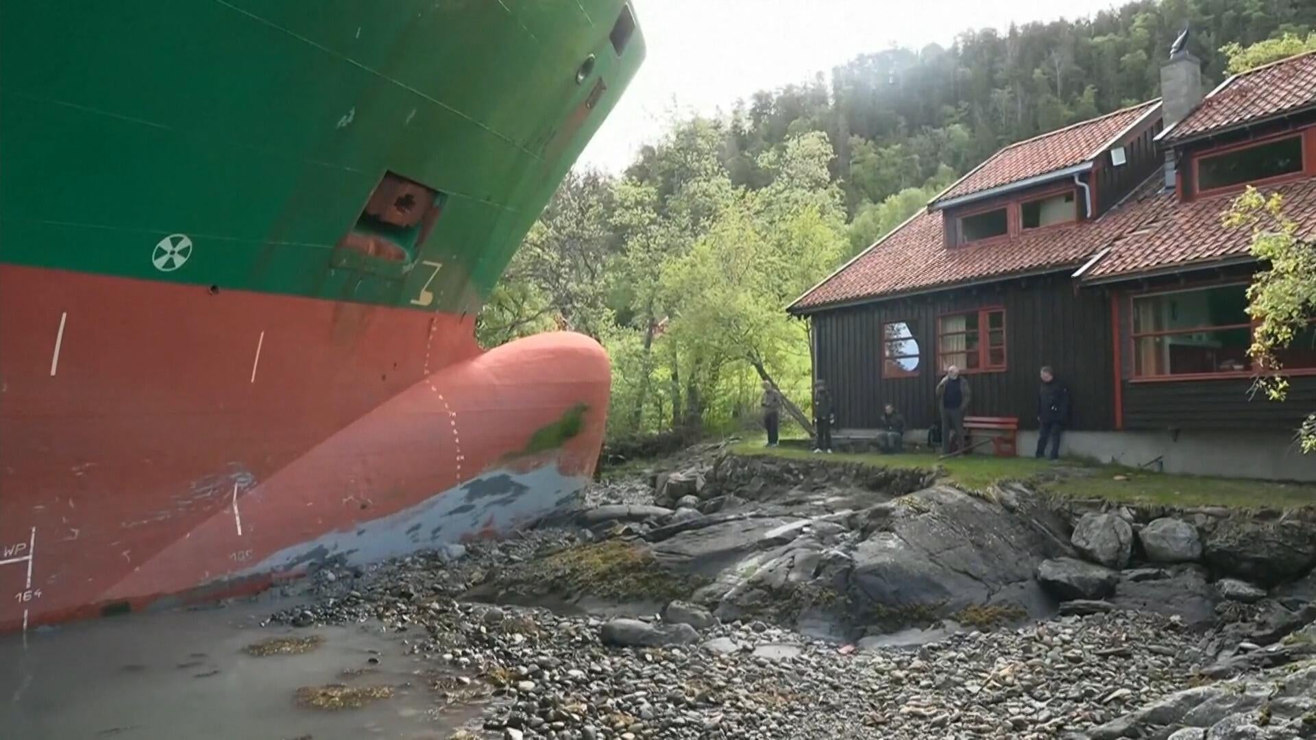 443-foot ship pulled free after nearly hitting home as owner slept