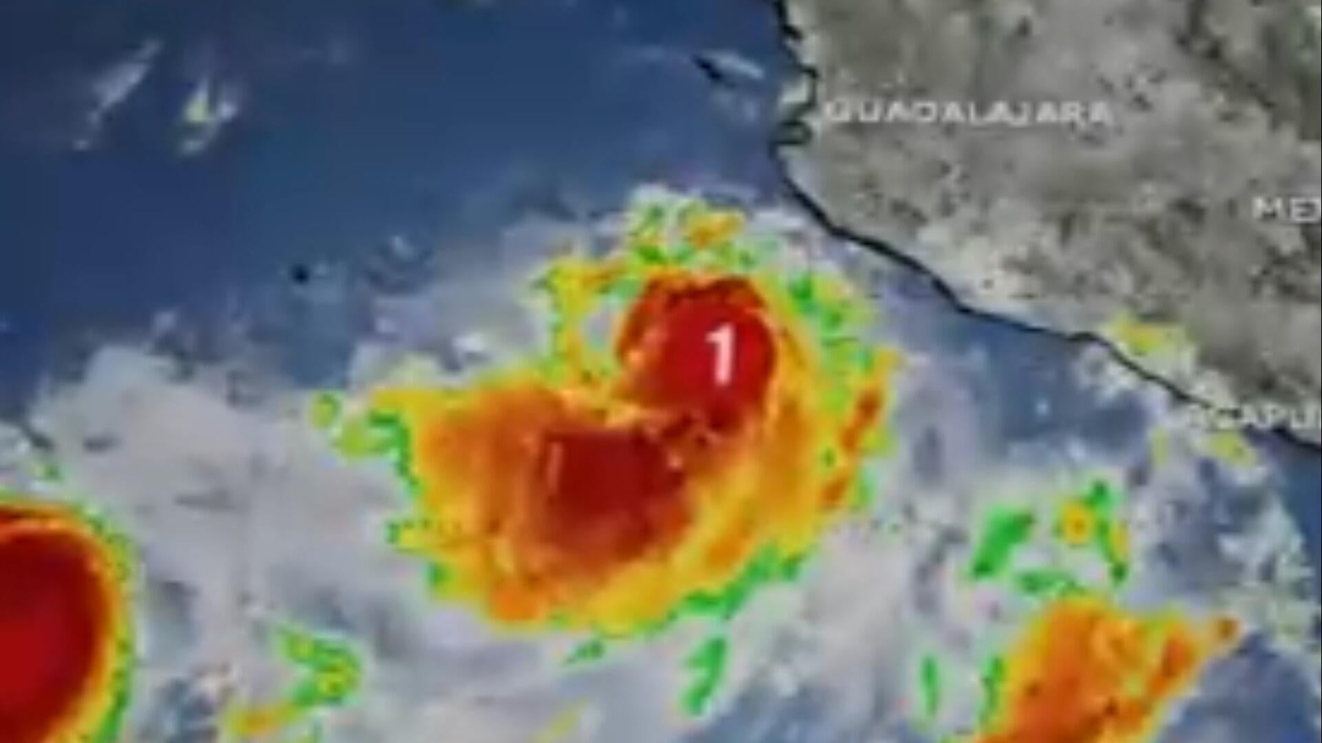 Barbara strengthens to a hurricane off the coast of Mexico