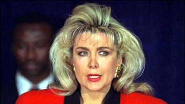 Gennifer Flowers speaks to the press about her claim of a 12-year affair with then-Democratic presidential hopeful Bill Clinton during a news conference in New York Jan. 27, 1992. 