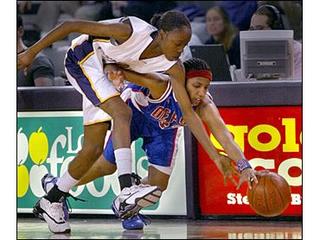 Marshall Faulk wearing the Air Zoom Flight 2K3 against the