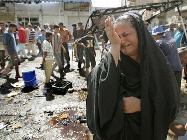 An Iraqi woman weeps 