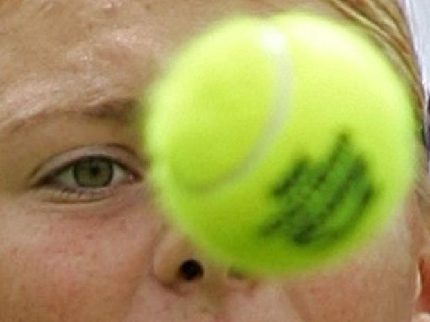Maria Sharapova watches a shot 