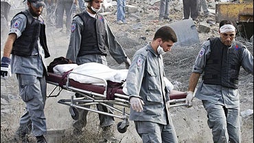Lebanese medics carry body of victim killed during Israeli attack 