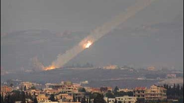 Katyusha rockets are fired from the outskirts of the southern Lebanese port city of Tyre into Israel, 06 August 2006 
