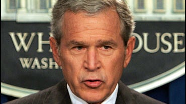 President Bush speaks during his first news conference in the new temporary White House pressroom 