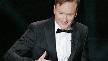 Host Conan O'Brien arrives on stage to open the 58th Annual Primetime Emmy Awards 