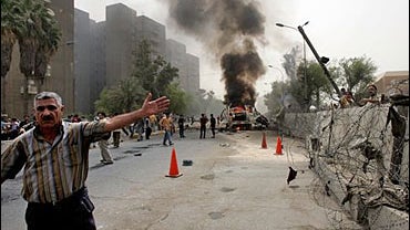 An Injured man of a suicide car bomb attack, waits for medical help, in a hospital, in Kirkuk 