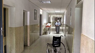 A Palestinian woman walks in the corridor at the main hospital of the West Bank town of Ramallah where health workers are on strike 