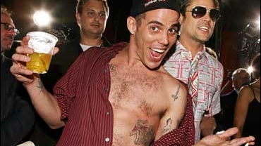 Actors Stephen "Steve-O" Glover and Johnny Knoxville arrive at the premiere of Paramount's "Jackass Number Two" at the Chinese Theater 