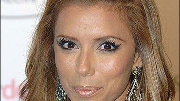 Eva Longoria arrives for the opening of Ken Paves new hair salon 