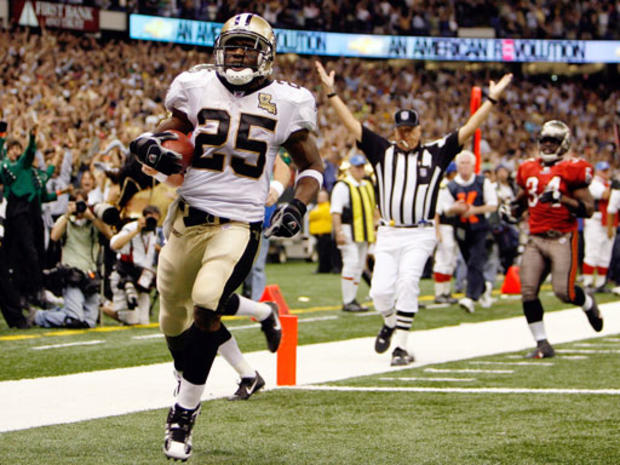 New Orleans Saints' Reggie Bush scores his first NFL touchdown on a 65-yard punt return in the fourth quarter of their game with the Tampa Bay Buccaneers at the Superdome in New Orleans 
