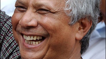 Bangladeshi Nobel Peace Prize winner Muhammad Yunus celebrates with wellwishers at his home in Dhaka, Bangladesh 