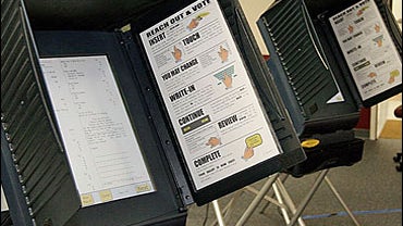 Electronic voting machines are seen before the opening of polls 07 November, 2006 at the Sudley North Government Center in Prince William County, Virginia. 
