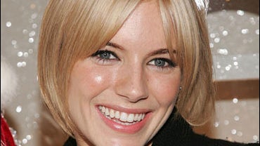 Sienna Miller attends the Cartier Holiday bow celebration 