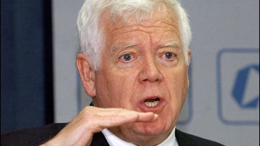 US Congressman Jim McDermott gestures while addressing a speech at the Confederation of Indian Industry 