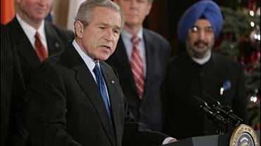 President Bush speaks at the White House, Monday, Dec. 18, 2006, prior to signing the U.S.-India Peaceful Atomic Energy Cooperation Act. 