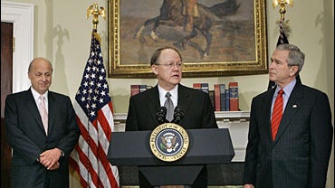 Mike McConnell, President Bush's nominee for National Intelligence Director, second from right, makes remarks as he is introduced in the Roosevelt Room of the White House in Washington, Friday, Jan. 5, 2007. 