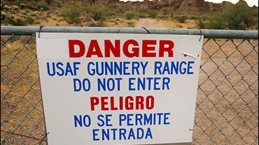 A signs warns of danger on the Barry M. Goldwater Air Force Range, one of several live aerial bombing ranges that illegal immigrants often walk through during their multi-day treks across the desert from Mexico dodging border patrol agents on March 28, 20 
