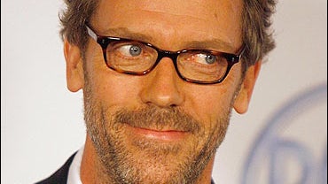 House" actor Hugh Laurie poses for photographers 