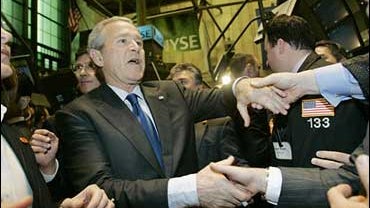 President Bush shakes hands with traders during an unscheduled visit to the floor of the New York Stock Exchange, Wednesday, Jan. 31, 2007. 