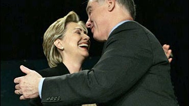 Democratic Presidential hopeful Sen. Hillary Rodham Clinton, D-N.Y., left, says goodbye to Democratic National Committee Chairman Howard Dean after speaking at the Democratic National Committee Winter Meetings 