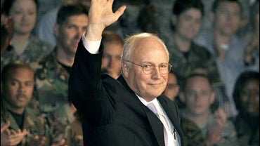 U.S. Vice President Dick Cheney waves to U.S. forces in Japan before his address aboard the USS Kitty Hawk aircraft carrier 
