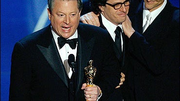 Al Gore, Davis Guggenheim and producers accepts Best Documentary Feature award 