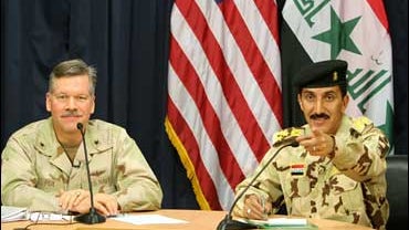 Iraqi army Brigadier Qassim Moussawi, Rear Adm. Fox, Baghdad 