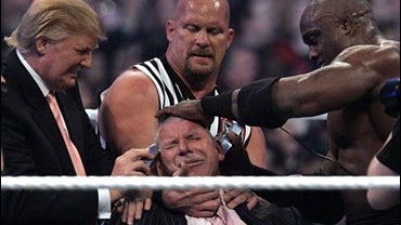 WWE Chairman Vince McMahon, center, held by "Stone Cold" Steve Austin, has his hair cut off by Donald Trump, left, and Bobby Lashley, right , after Lashley defeated Umaga at Wrestlemania 23 