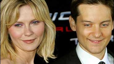 "Spider-Man 3" stars Tobey Maguire, right, and Kirsten Dunst smile upon their arrival at the film's world premiere in Tokyo Monday, April 16, 2007. The will make its U.S. premiere at the Tribeca Film Festival on April 30, sparking a week of celebrations i 