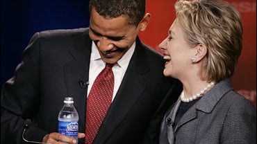 Sen. Barack Obama, D-Ill., left, shares a laugh with Sen. Hilary Rodham Clinton, D-NY prior to the start of the Democratic presidential primary debate of the 2008 election 