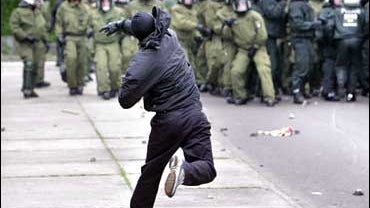 Demonstrators clash with police at G-8 Summit protests in Rostock, Germany 