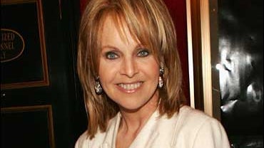 Claudia Cohen arrives at the premiere of "United 93" during the Fifth Annual Tribeca Film Festival at the Ziegfeld Theatre April 25, 2006 in New York City. 