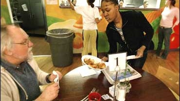high school volunteer at Chicago cafe 