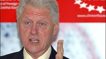 Former President Bill Clinton speaks in Dublin in Sept. 2006, after Irish Prime Minister Bertie Ahern signed an agreement to commit millions to the global foundation run by Clinton, for its program fighting HIV and AIDS. Clinton's planned book on citizen  