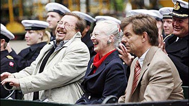 Danish composer James Price,left, Denmark's Queen Margrethe and Tivoli Gardens Director Lars Liebst, right, 