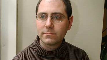 Jesse Friedman poses for a portrait in his lawyer's New York office where Friedman was helping to prepare a motion to overturn his 1988 conviction on child sex abuse charges in this Wednesday, Jan. 7, 2004 file photo. After serving 13 years in prison, a L 