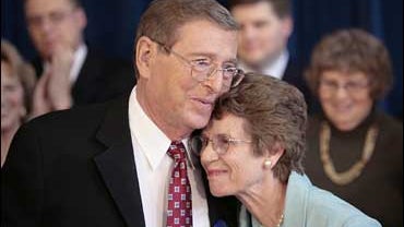 Sen. Pete Domenici, R-N.M., embraces his wife Nancy, right, as he finishes a press conference, Thursday, Oct. 4, 2007, in Albuquerque, N.M. Domenici, one of the most influential voices in Congress on budget and energy issues, announced Thursday that he is 